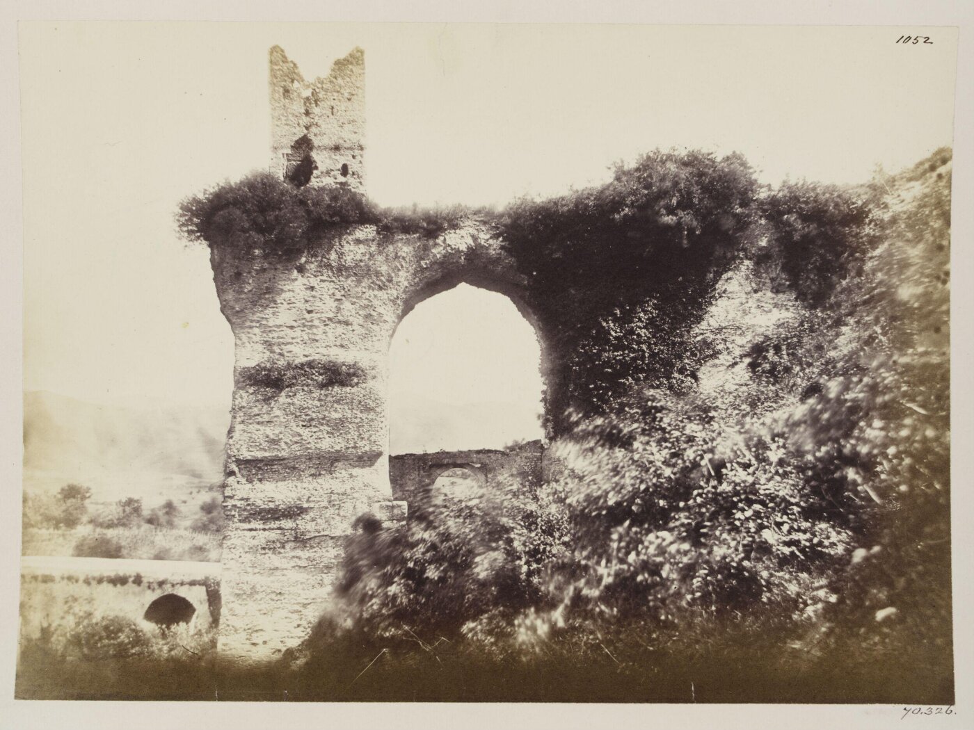 Parker, John Henry, Aqueducts - Arcade of the Anio Novus, in the Valley of the Arches near Tivoli, with Medieval Tower upon it.