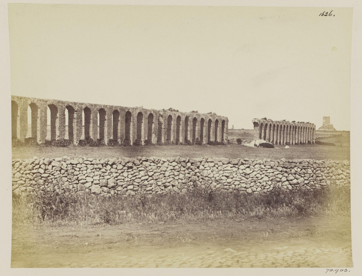 Parker, John Henry, Aqueducts - Arcade of the Aqua Severiana, near the Torre  di Mezza Via, with the fortified Tomb.