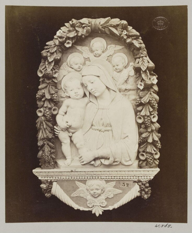 Basrelief depicting the Virgin and Child on blue ground Luca della