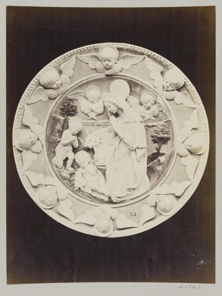 Circular bas-relief depicting the Nativity in enamelled earthenware top image