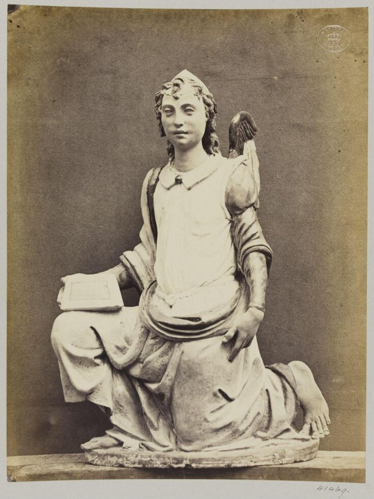 Figure of an Angel Kneeling, enamelled earthenware top image