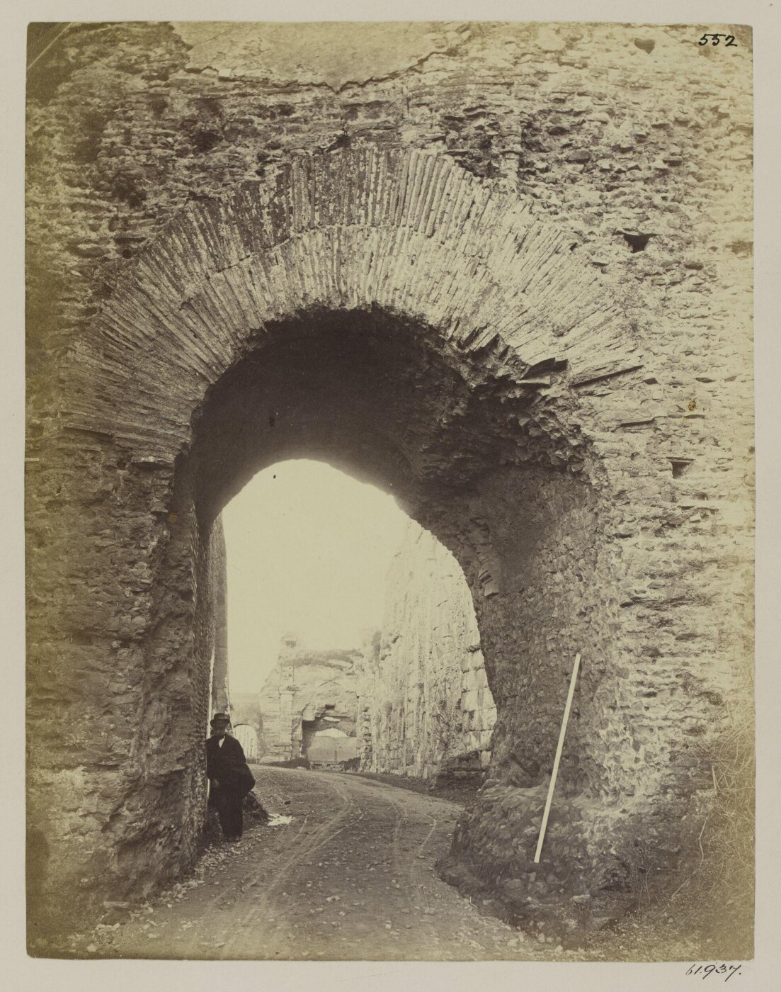 Parker, John Henry, Aqueducts - Arcade of the Claudian and Marcian Aqueducts, near the Porta Furba, at an angle crossing the road.