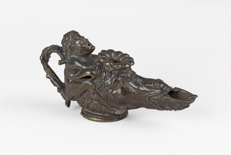 Oil lamp in the form of a Horse's Head ridden by a Dwarf top image