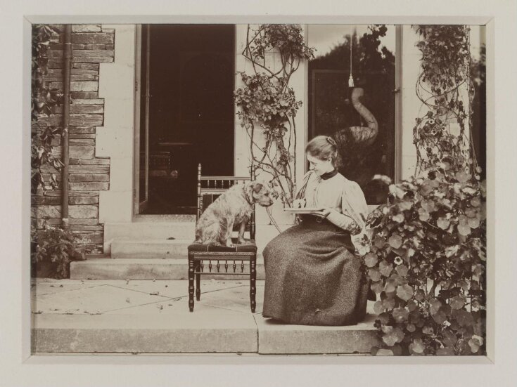 Beatrix Potter (1866-1943) with a Border terrier at Lingholm, Keswick top image