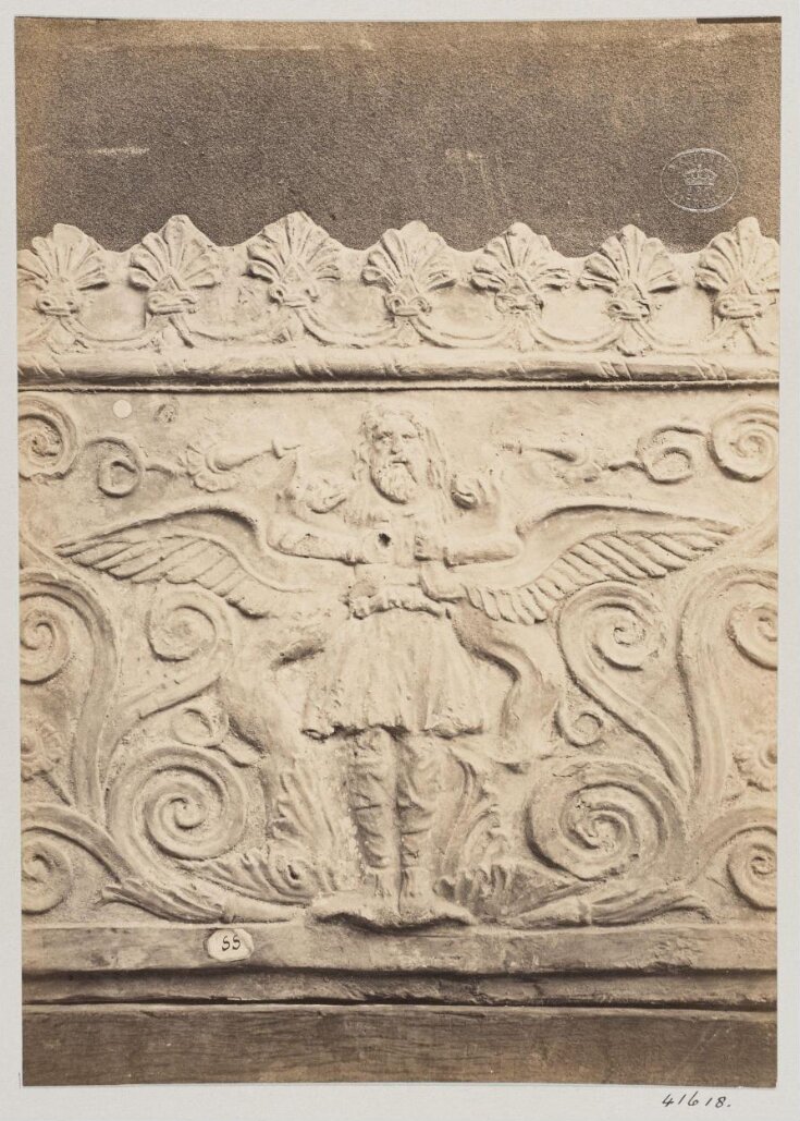 Bas-relief portion of a frieze of a flying genie in terra cotta top image