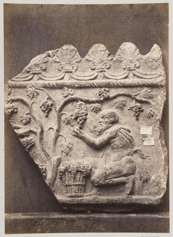 Bas-relief portion of frieze with harvesting satyr in terra cotta top image