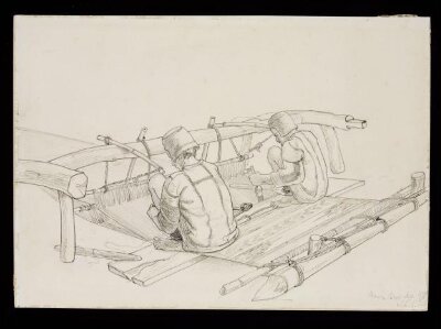 Two men weaving a dari on a loom