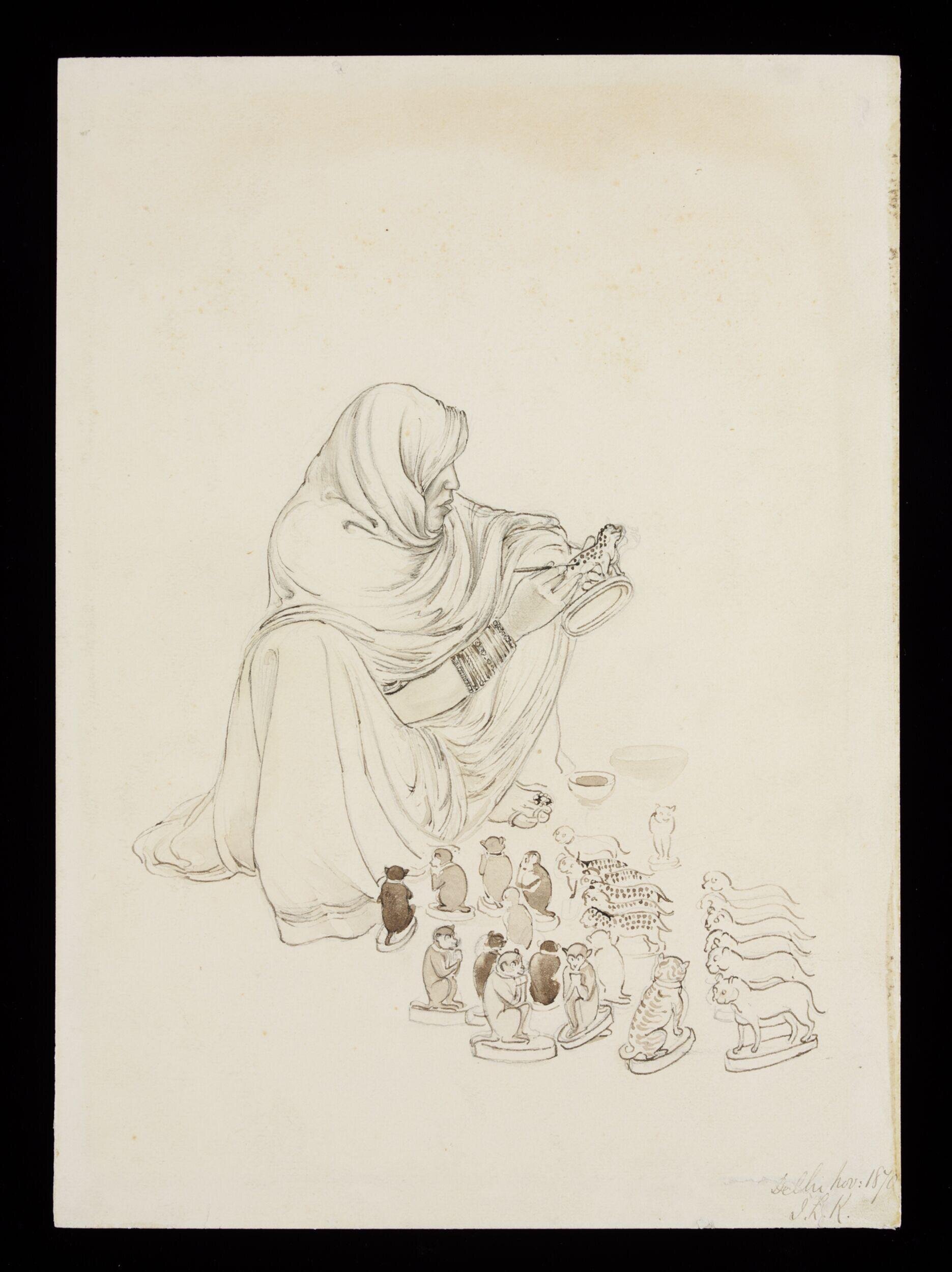 A seated woman painting spots on a toy leopard