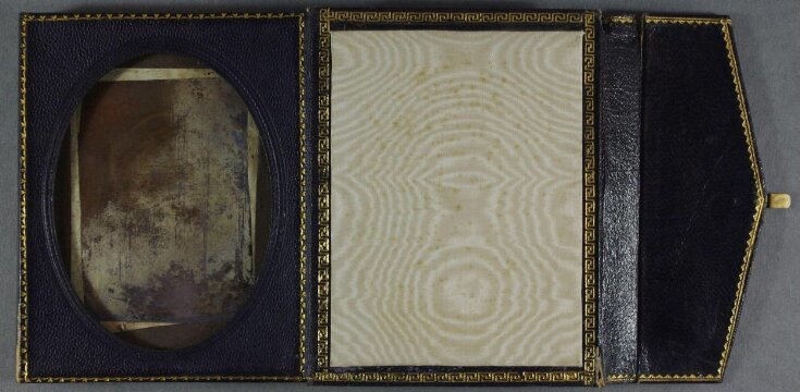 Stereoscopic hand-tinted daguerreotype portrait of a man, half length top image