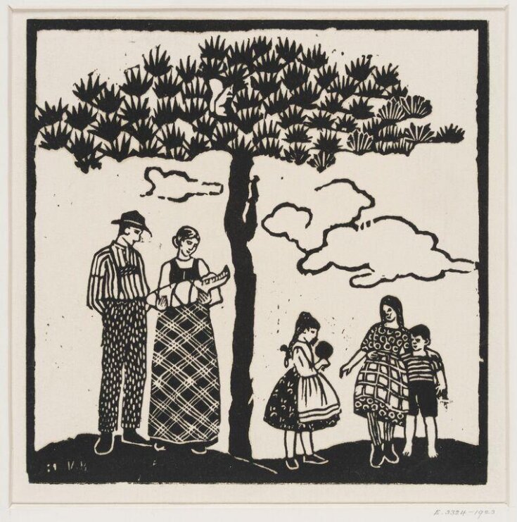 Man, woman and children standing under a tree top image