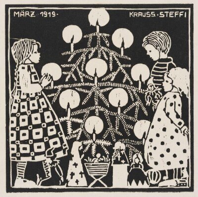 Three children standing by a Christmas tree