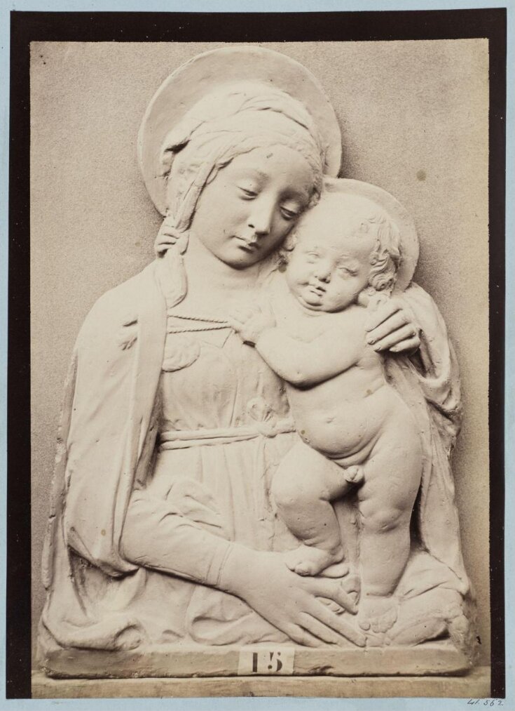 Bas-relief depicting the Virgin and Child by Donatello in red terra cotta top image