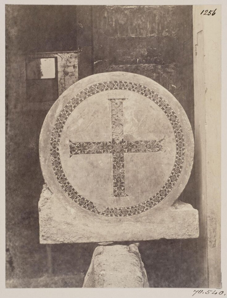 Church of S. Angelo in Pescheria - Slab with Cross in a circle of ribbon Mosaic-work of the Cosmati, from the Doorway, c. A.D. 1295 top image