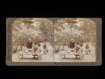 A family picnics under the cherry trees, Kyoto