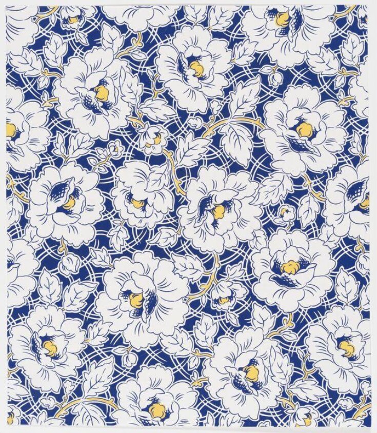Design of a large floral pattern and stems on a blue ground. top image