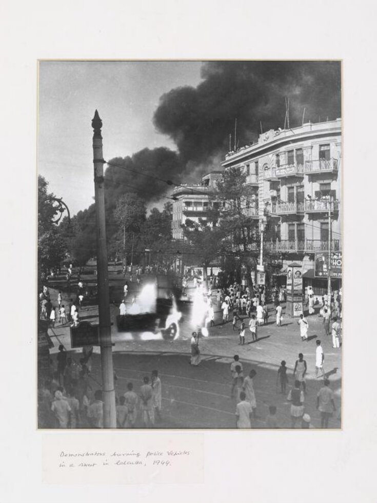 Burning police vehicles in a Calcutta street during Anti-Imperialist demonstrations on Rashid Ali Day 1942 top image