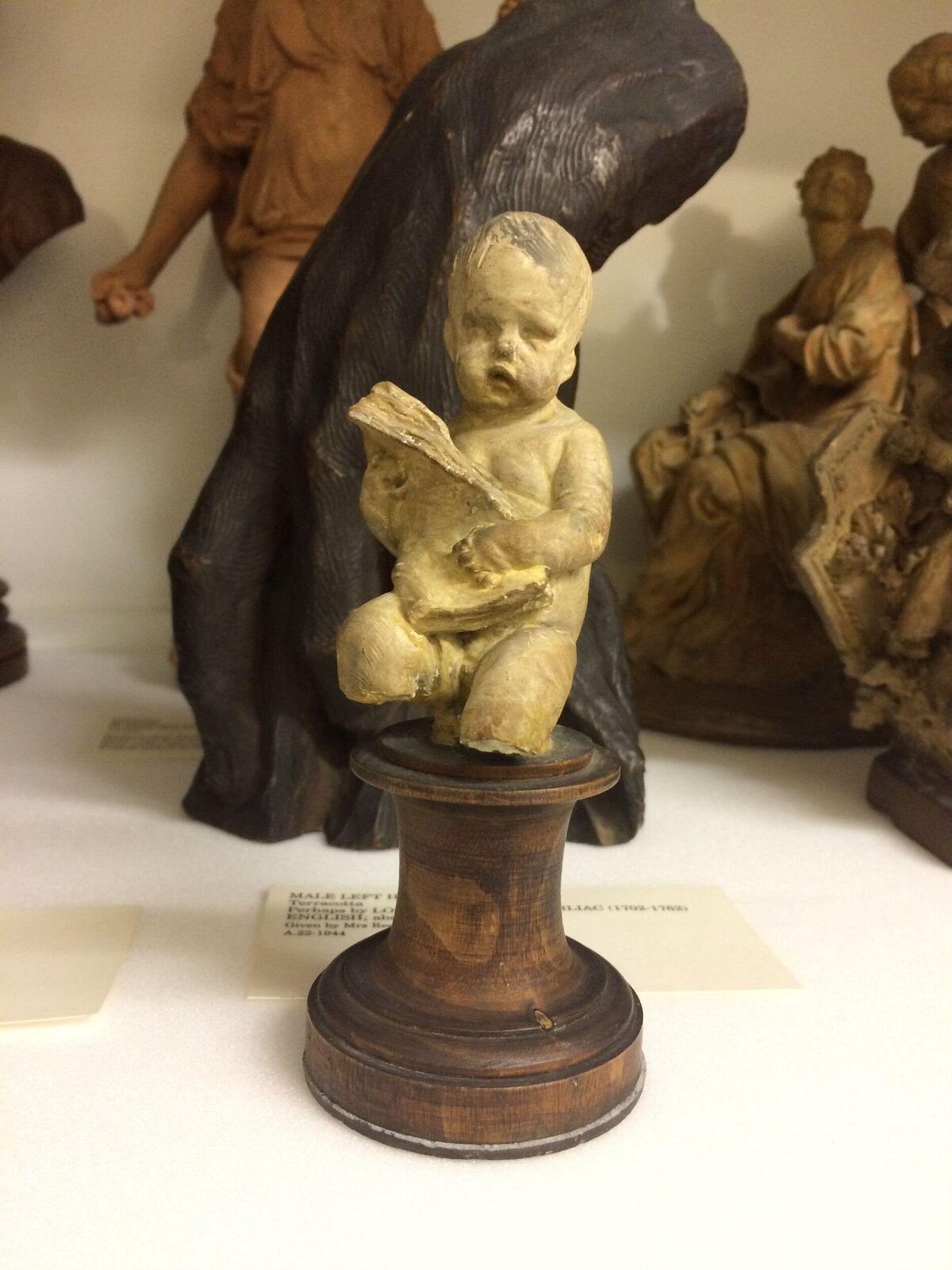 Child with a book, Duquesnoy, 17th century possibly