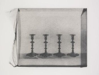 Four Silver Candlesticks