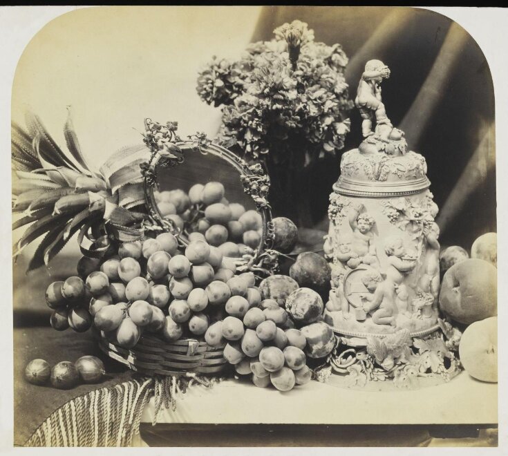 Ivory cup, fruit and mirror top image