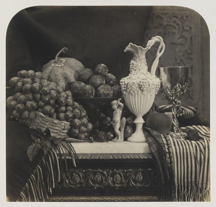 Parian vase, grapes and silver cup top image