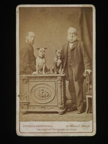 Portrait of Two Unknown Men and Two Dogs