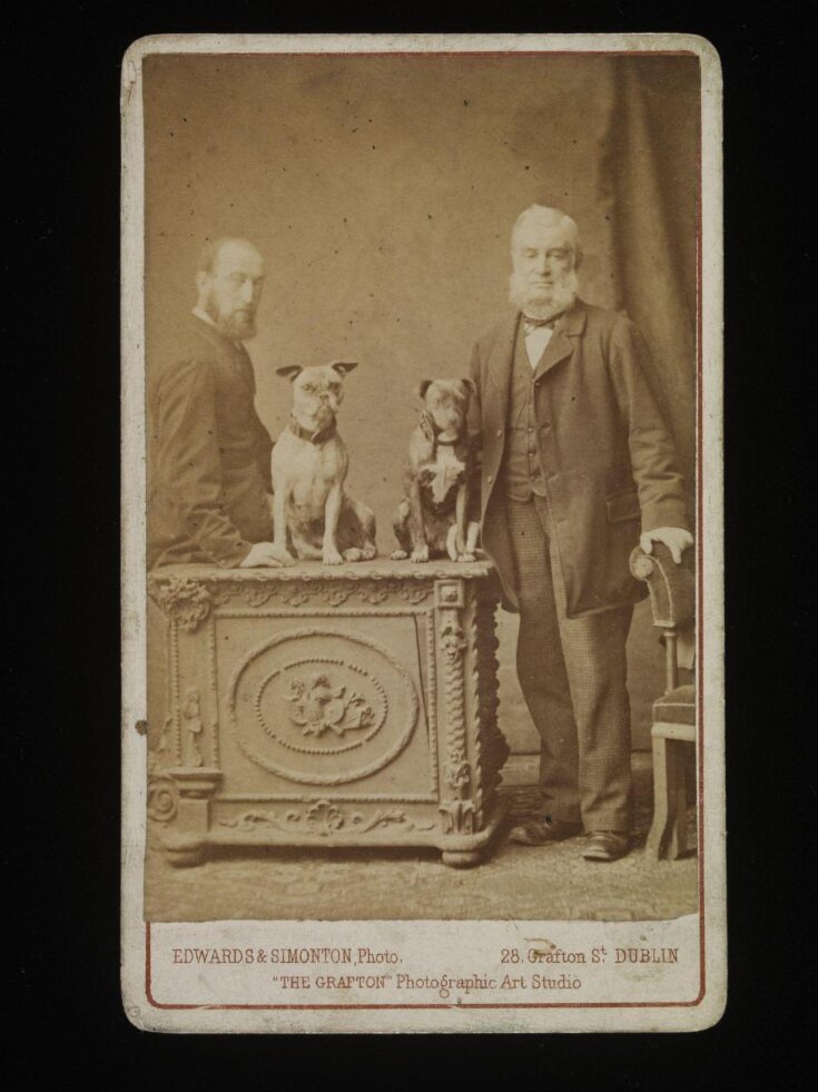 Portrait of Two Unknown Men and Two Dogs image