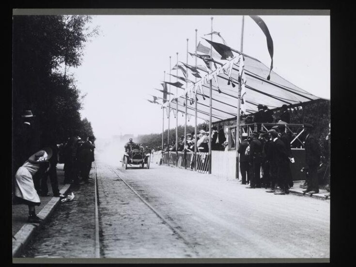 A car and the grand stand top image