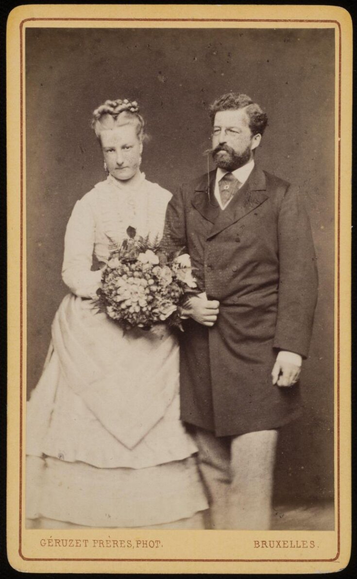A portrait of a wedding couple image
