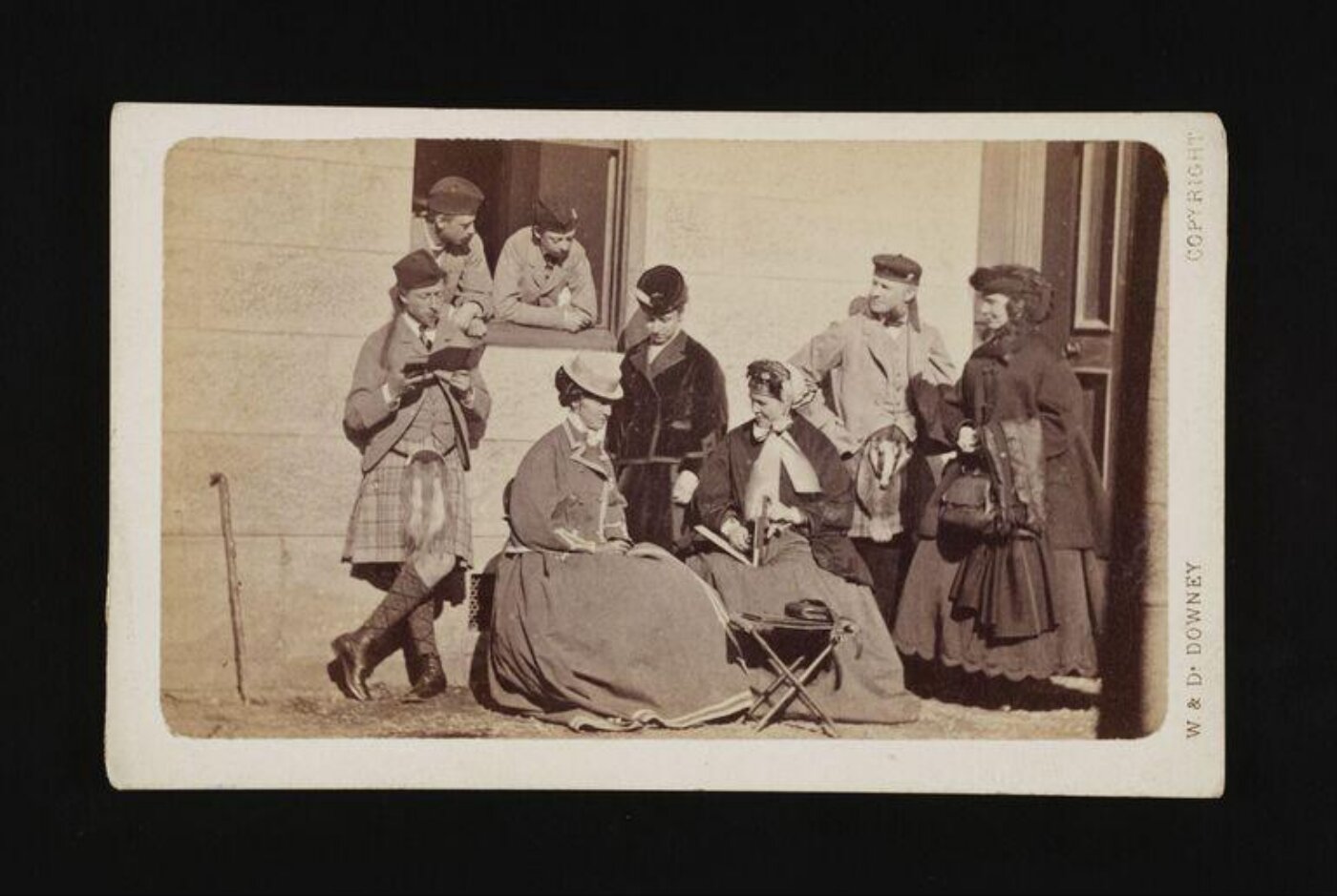 W. & D. Downey, A group of eight people