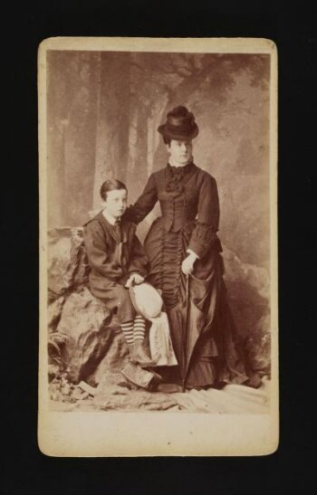 A portrait of a woman and boy