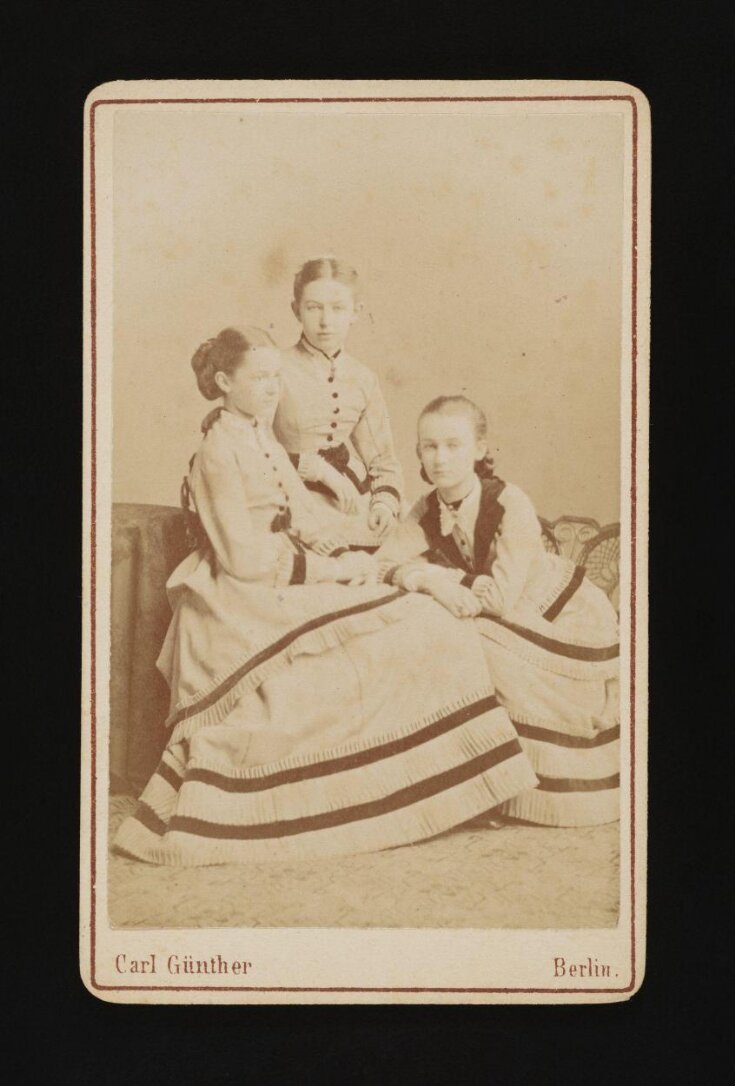 A photograph of three young girls image