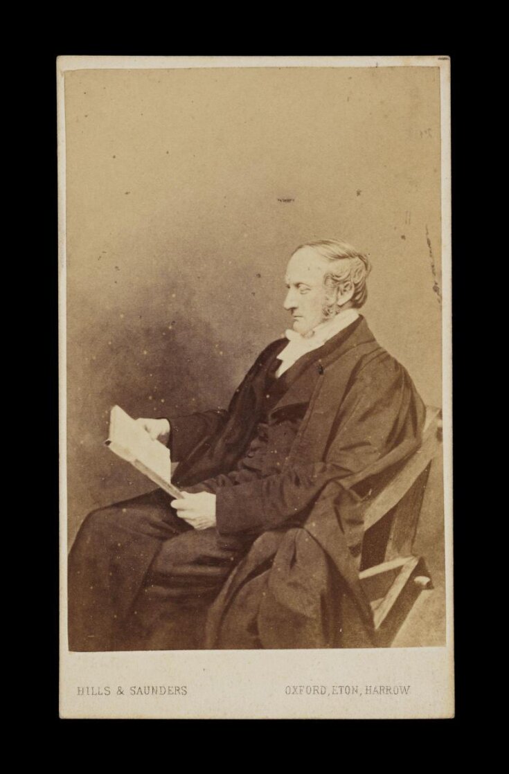 A portrait of a man reading image