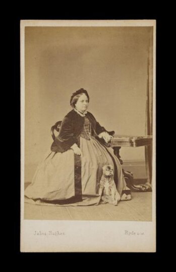 A portrait of a woman and dog