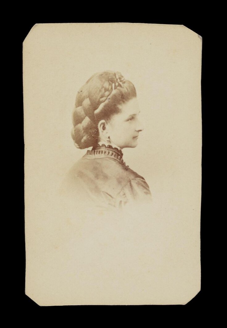 A portrait of a woman 'Miss I. Wyman' top image