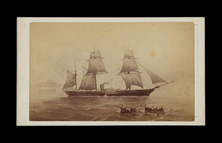 ship at sea with two rowboats in the foreground top image