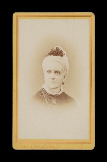 Portrait of a woman adorned with Jewellery and a head piece