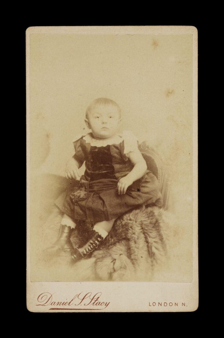 A portrait of a young child top image