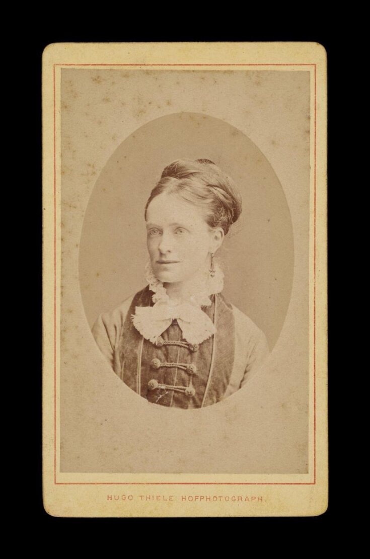 A portrait of a woman top image