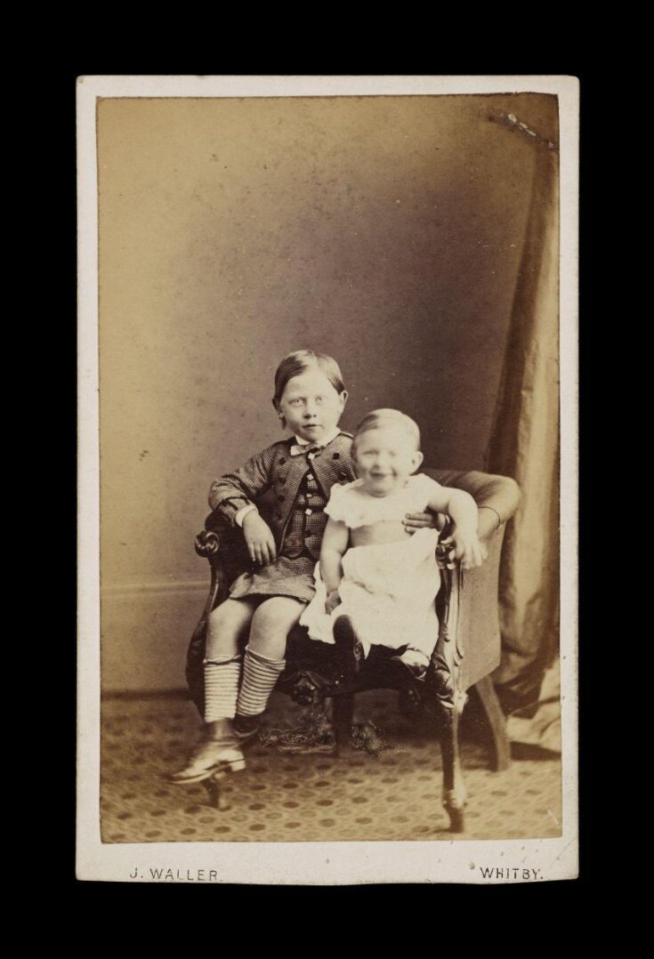 A portrait of two children top image