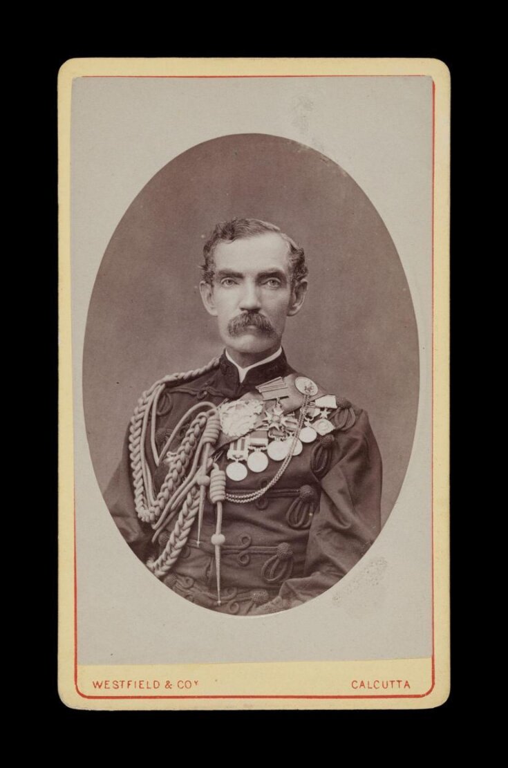 A portrait of a man in military uniform top image