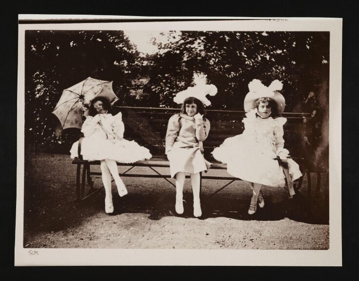 Three Girls on Park Bench top image