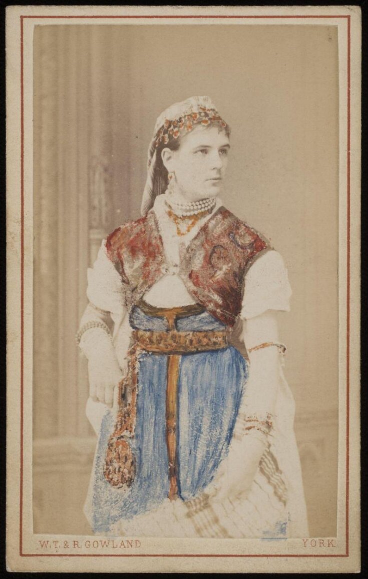 A portrait of a woman top image