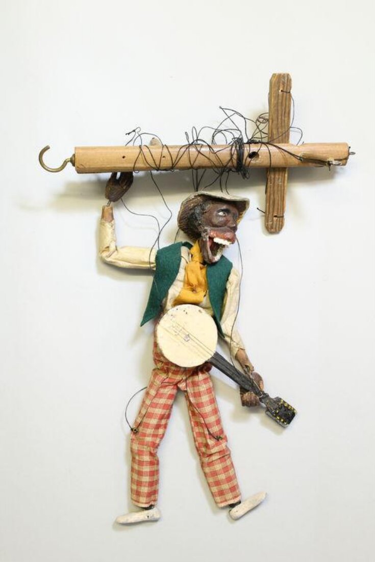Marionette of a banjo player top image