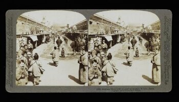 Asakusa Street, with its passing throngs, Tokyo