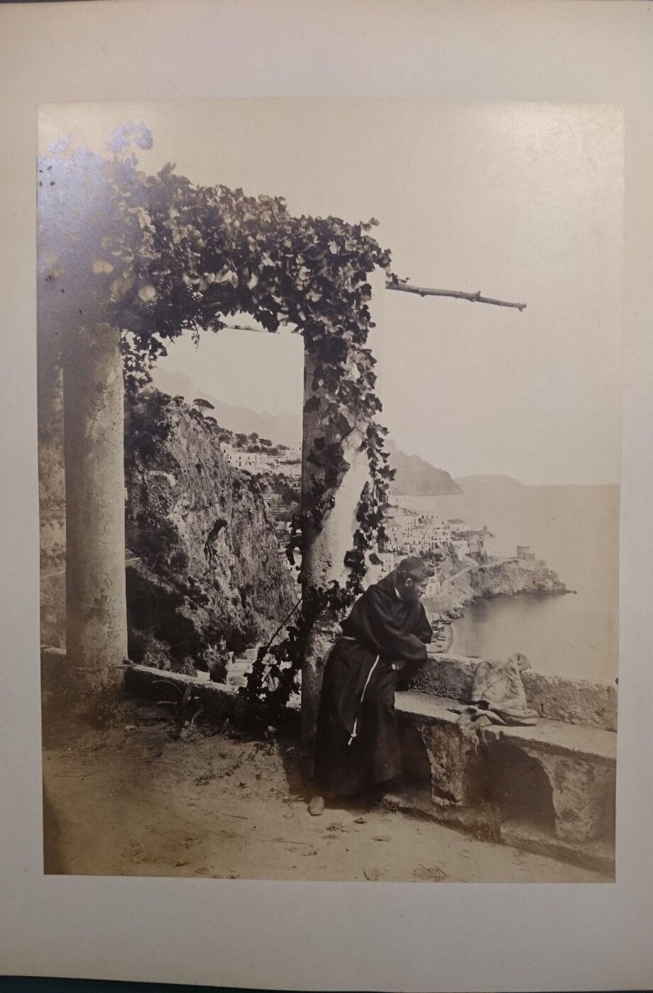 Unknown, Amalfi above Sorrento with a monk sitting on a stony bench, Italy