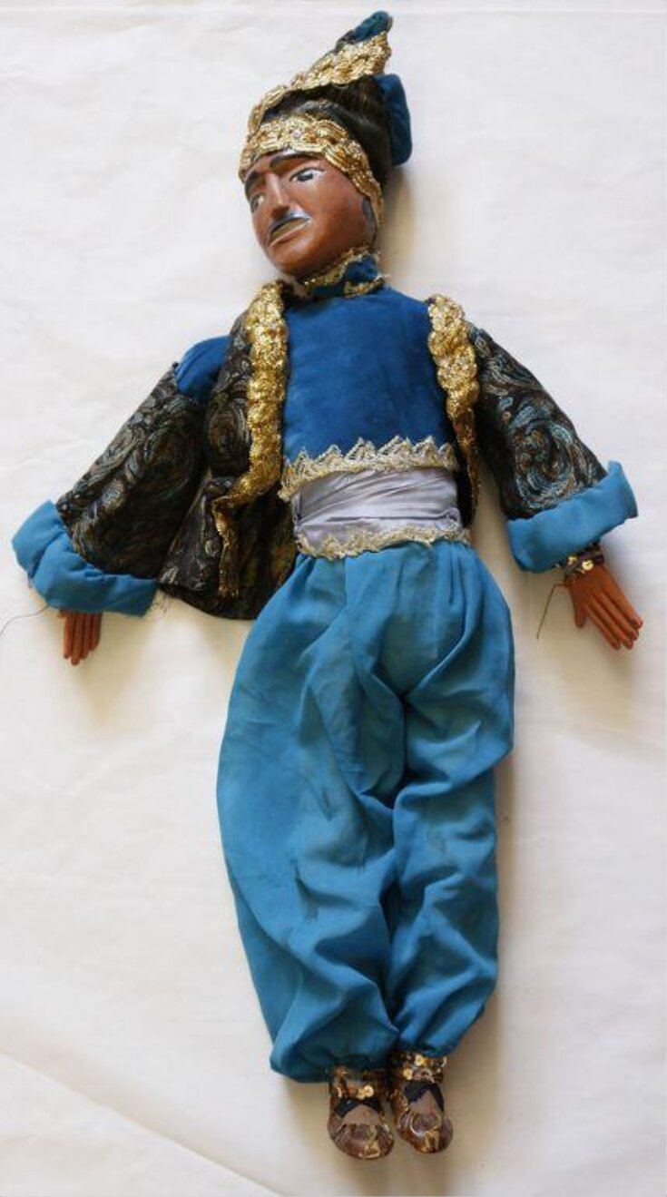 Marionette of a man in Middle-Eastern style dress top image