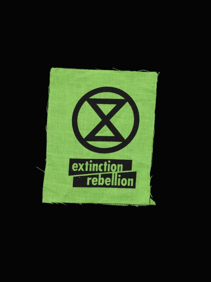 Extinction Rebellion fabric patch top image