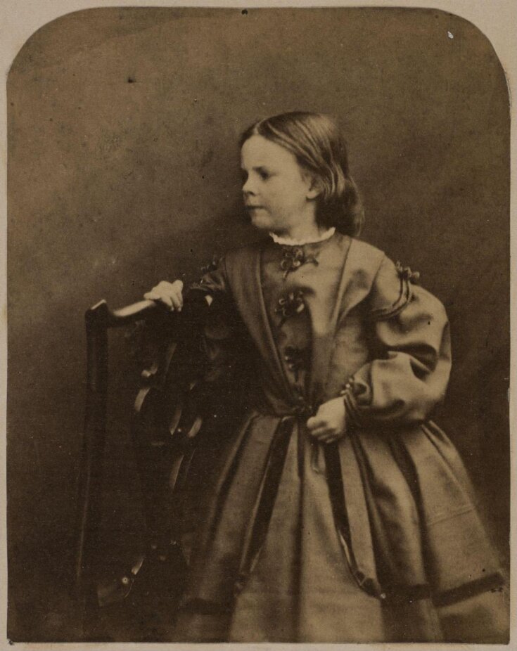 Louisa Barry holding onto back of chair top image