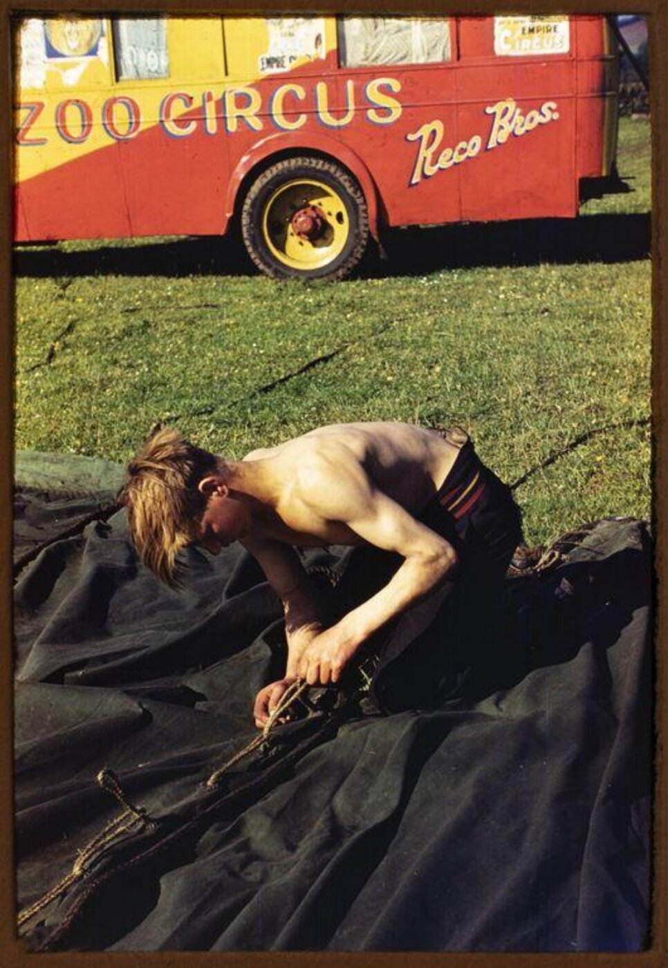 Hinde, John Wilfrid, view of a young man working on a canvas tent