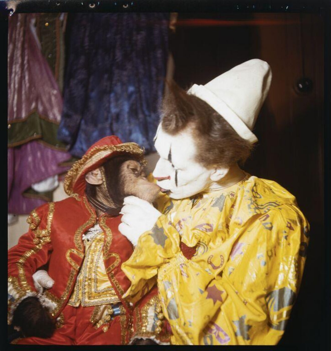 Hinde, John Wilfrid, clown kissing chimpanzee